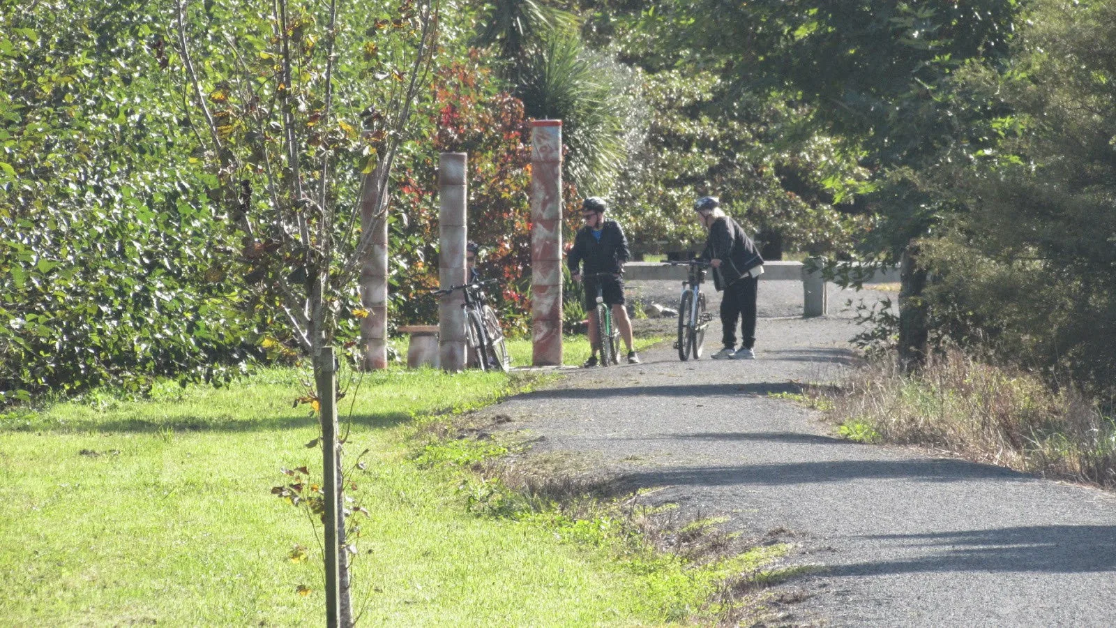 Cyclists stop to check they are heading the right way