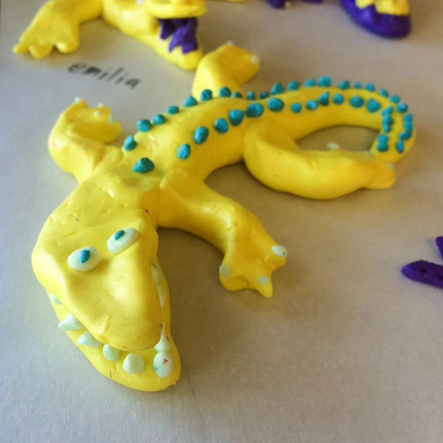 A clay alligator made in a Klay Master workshop