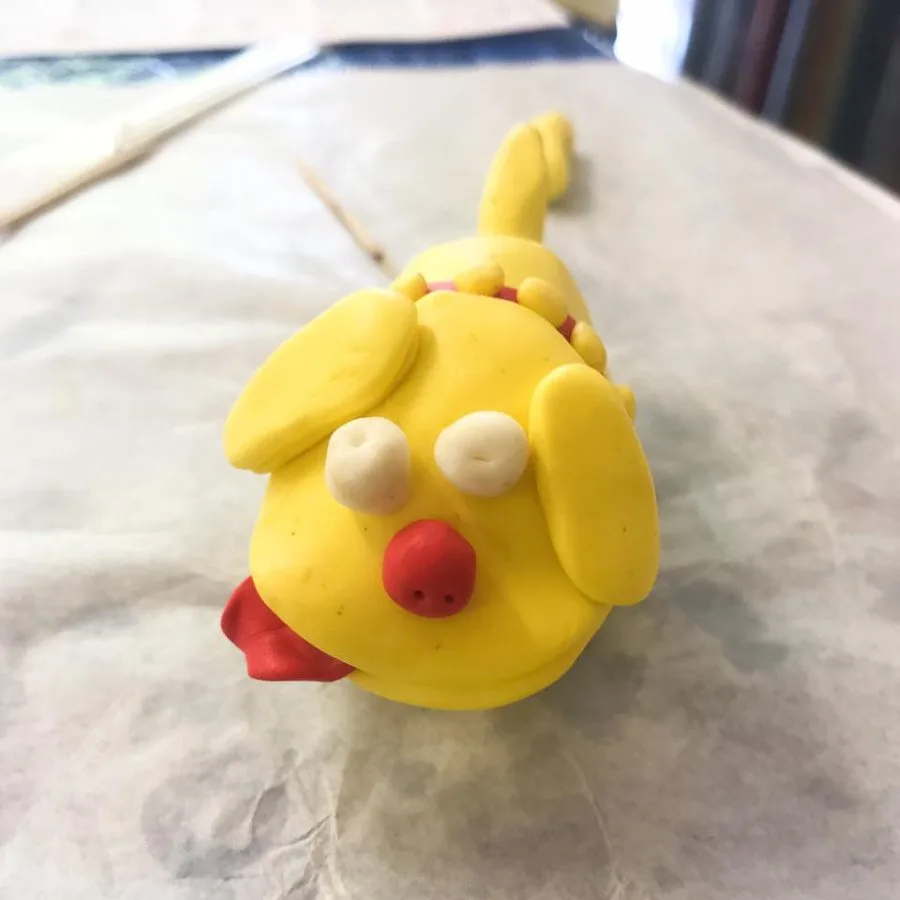 A clay dog made in a Klay Master workshop