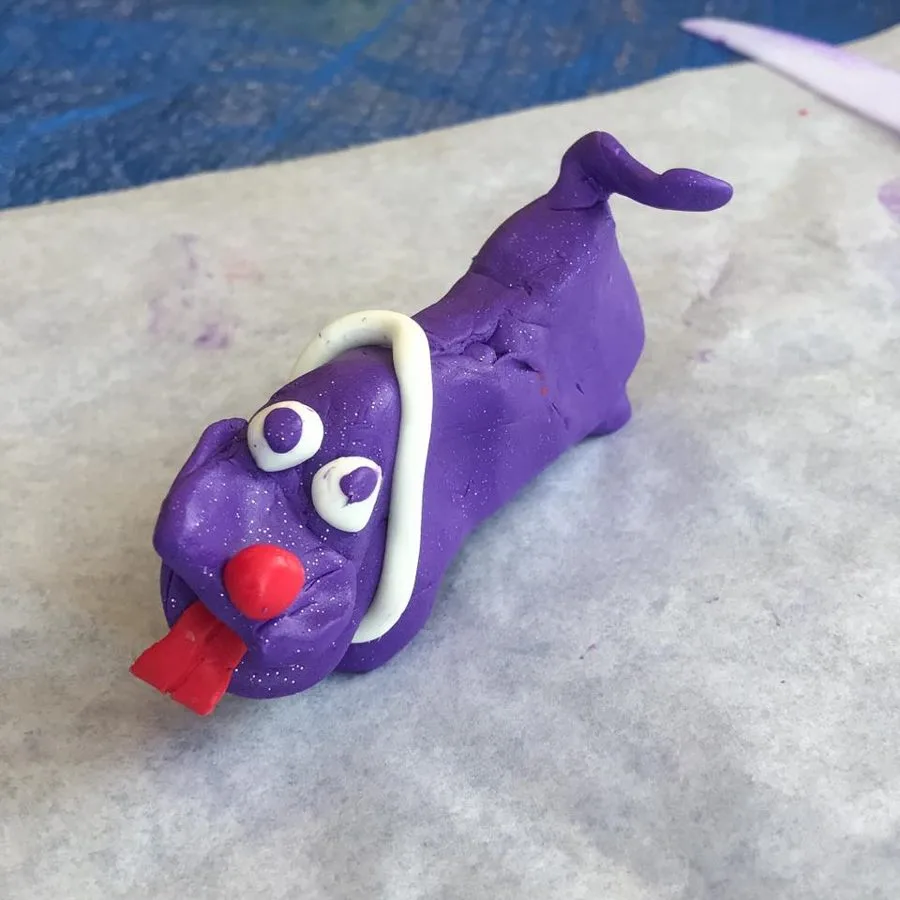 A clay dog made in a Klay Master workshop