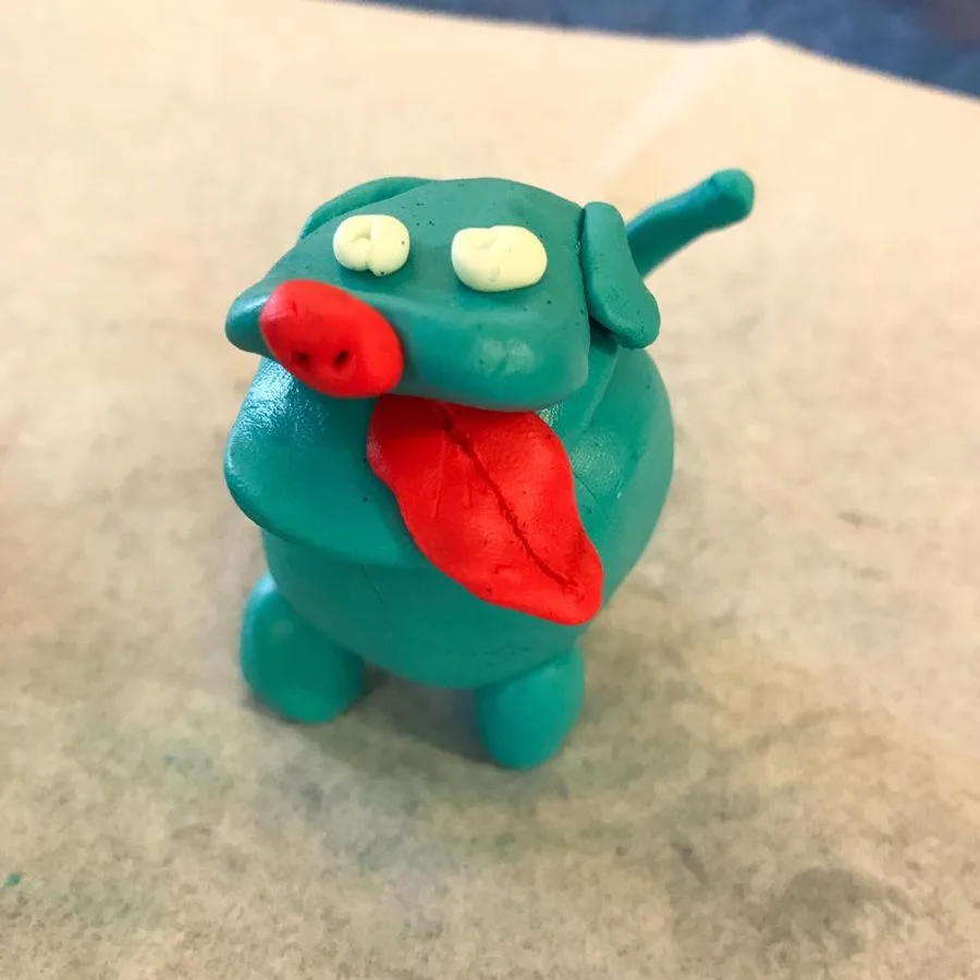 A clay dog made in a Klay Master workshop