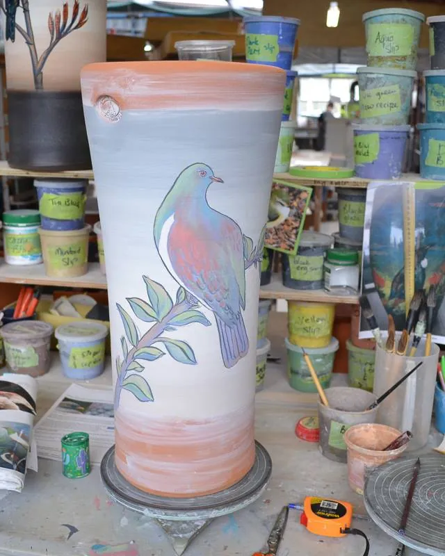 A decorated pot before the glaze firing