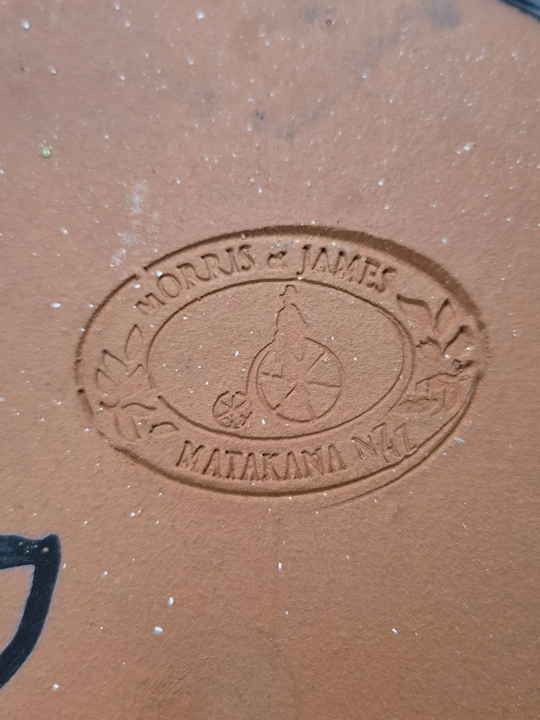The Penny Farthing badge, stamped on the underside of flatware