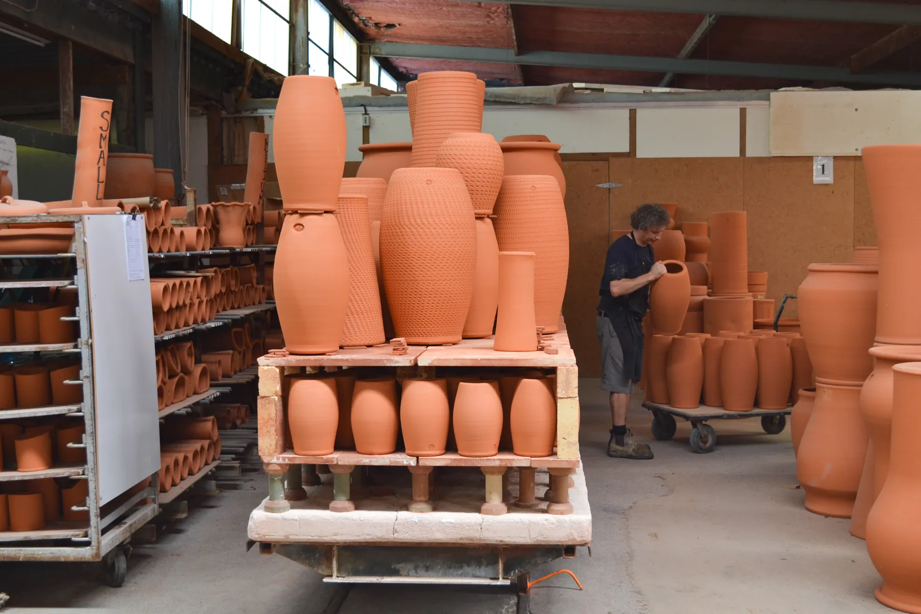 Fired terracotta stacked on the kiln car