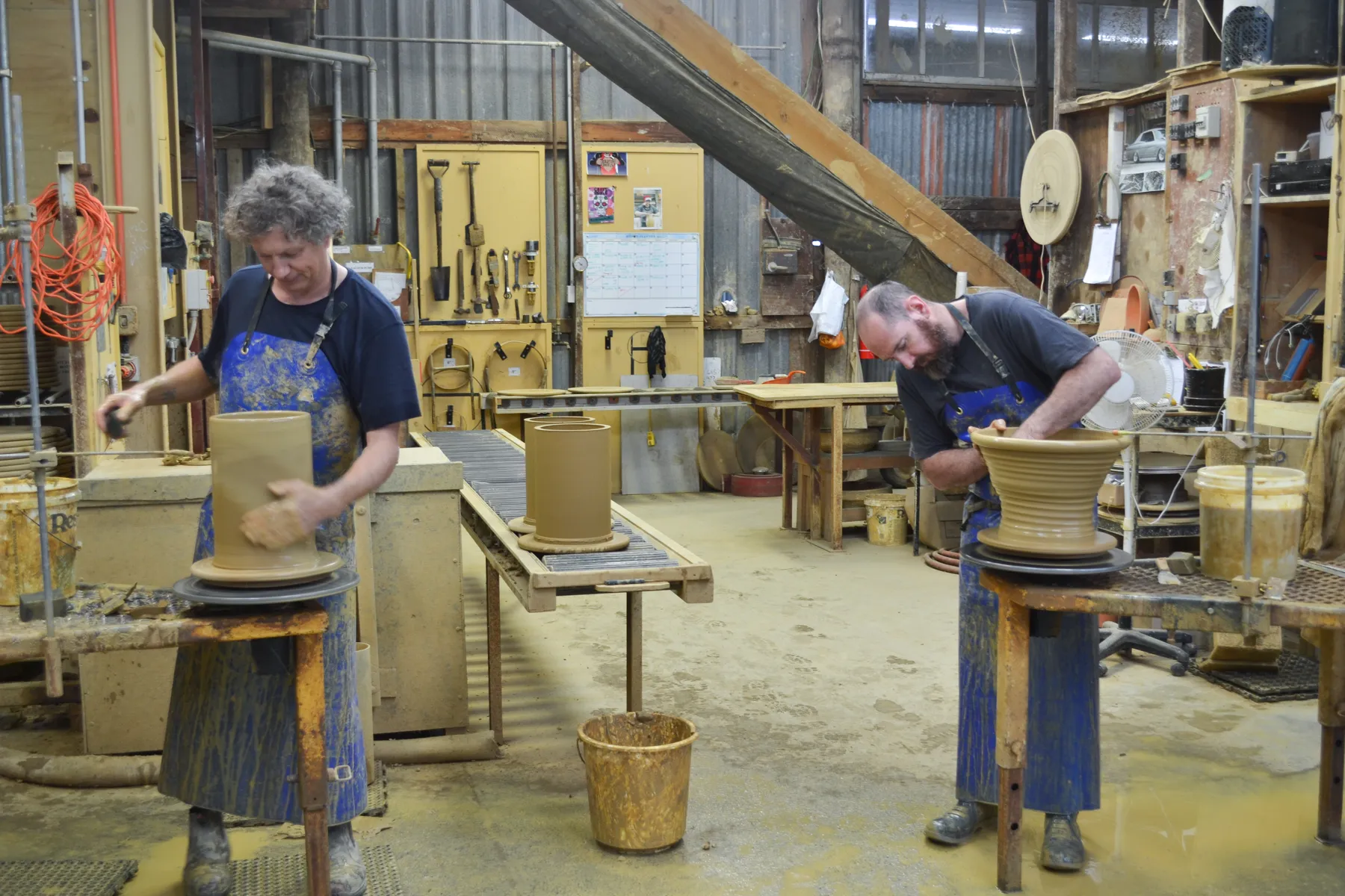 Throwing side by side in the workshop