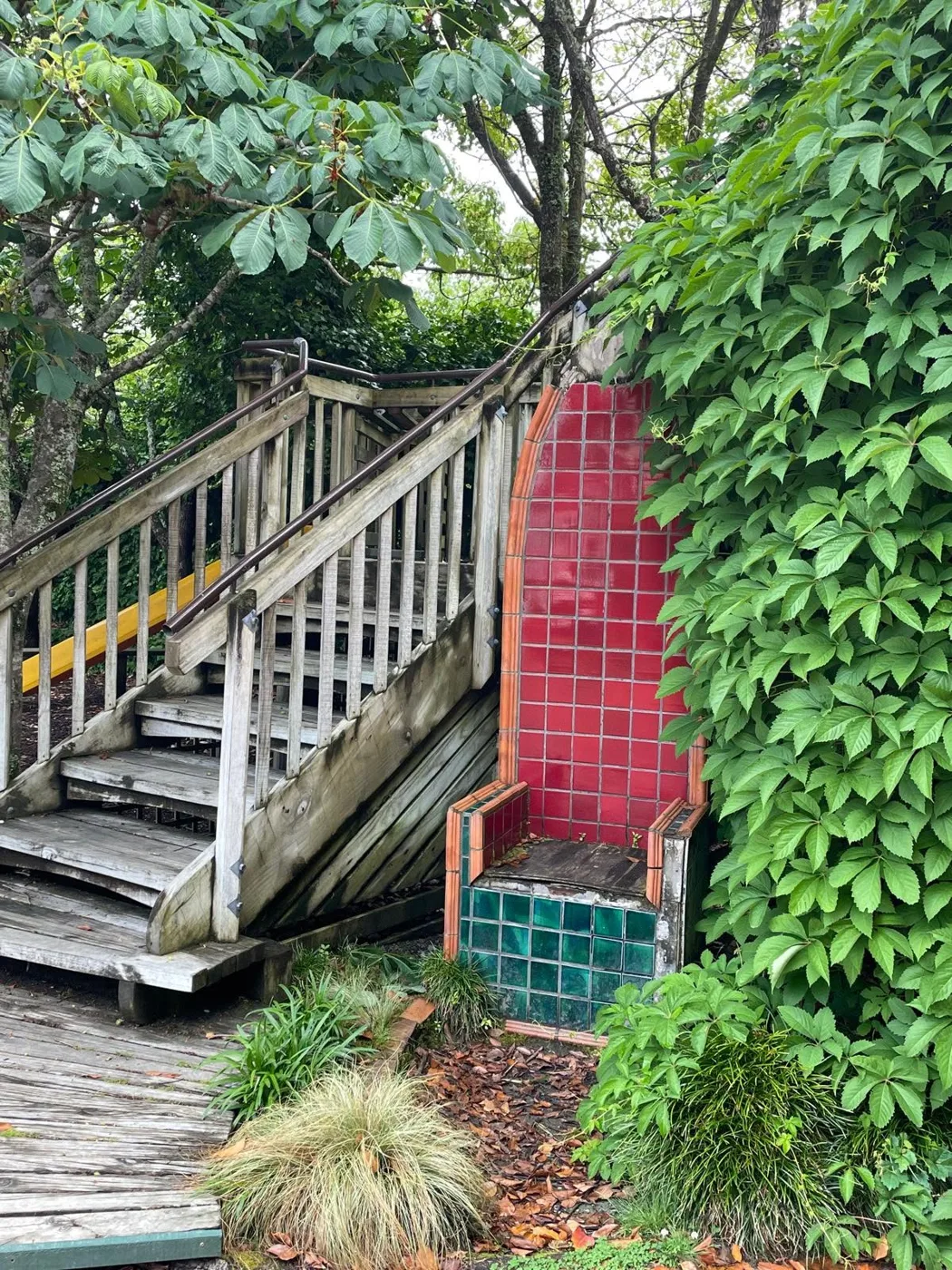 The tiled chair beside the playground steps