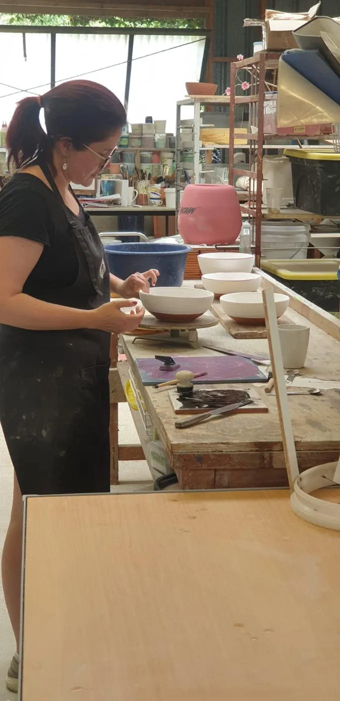 Morris & James staff together at the pottery