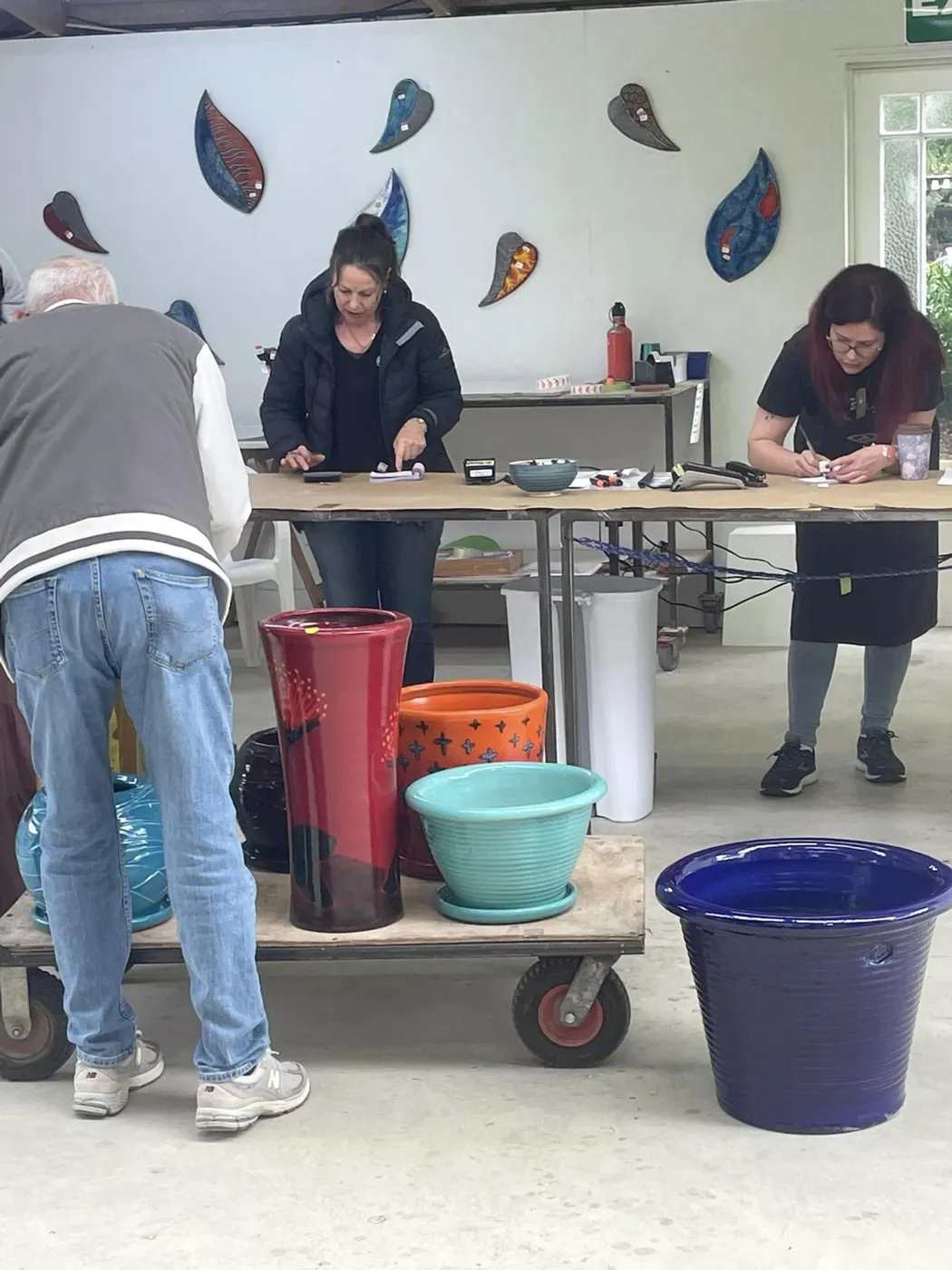 Morris & James staff together at the pottery
