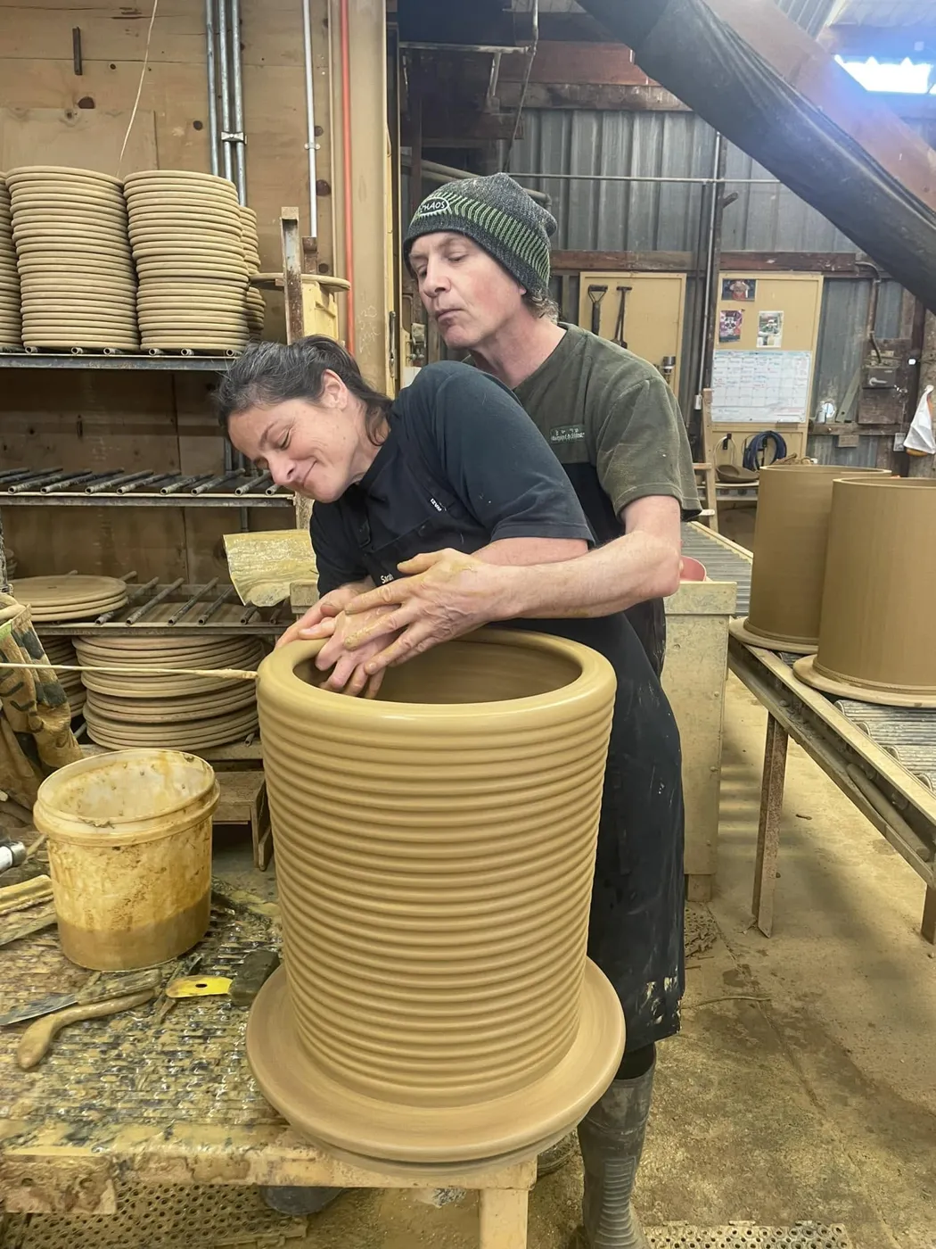Morris & James staff together at the pottery
