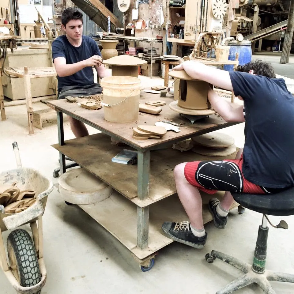 Morris & James staff together at the pottery
