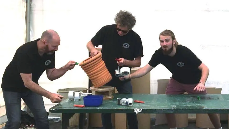 Morris & James staff together at the pottery