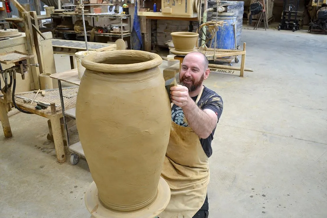 Morris & James staff together at the pottery
