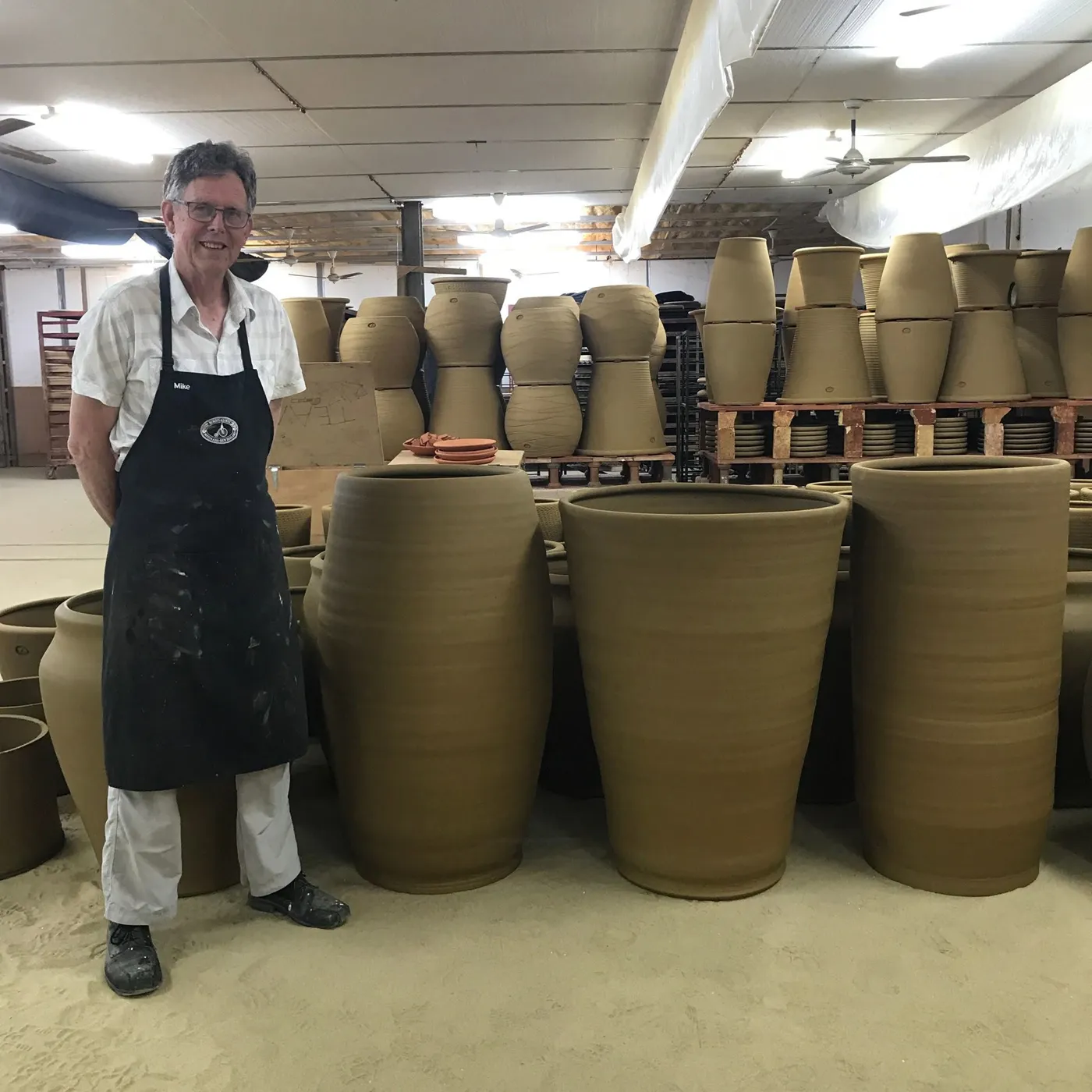 Morris & James staff together at the pottery