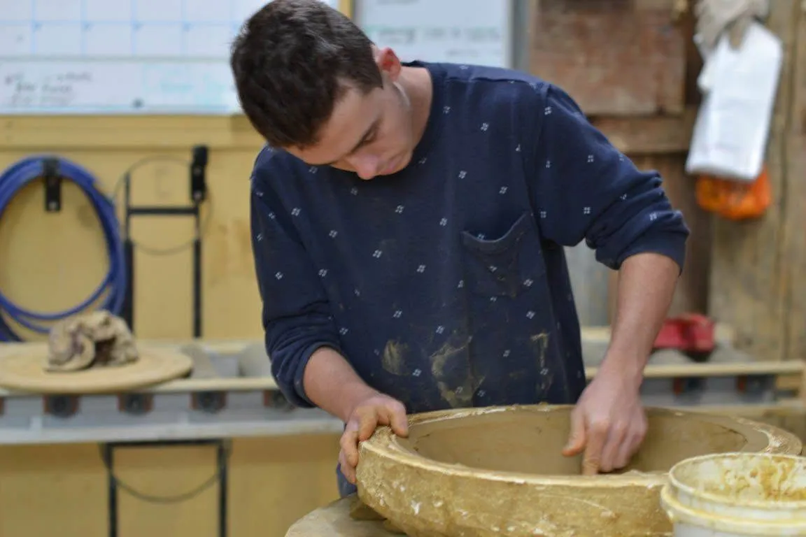 Morris & James staff together at the pottery