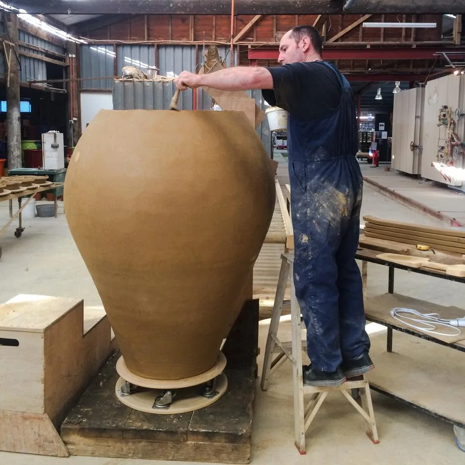 Ian Foote building the 500 litre terracotta wine amphora in the Matakana factory