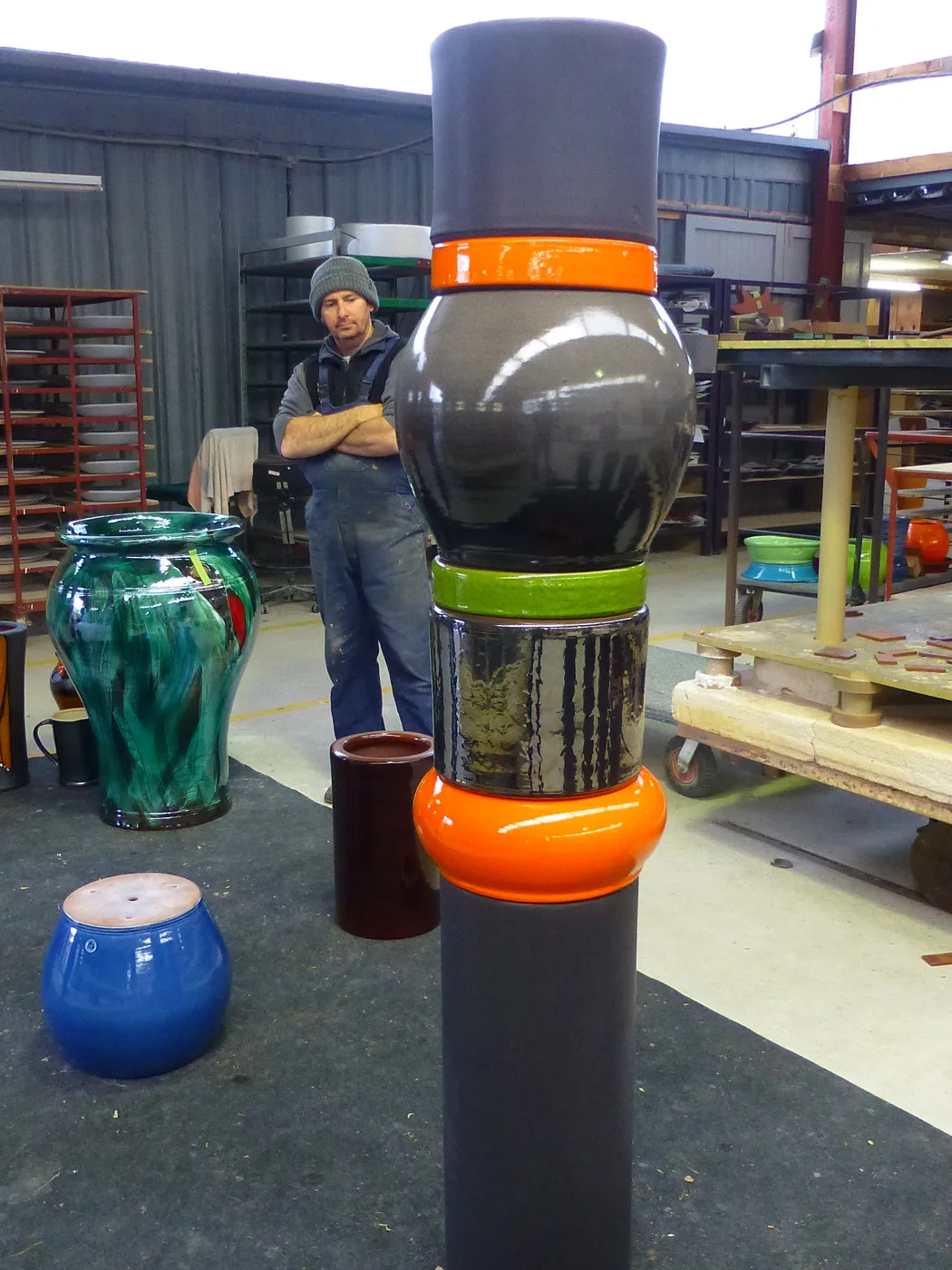 A finished column, black with orange and green