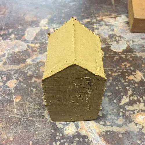 A block shaped into a house