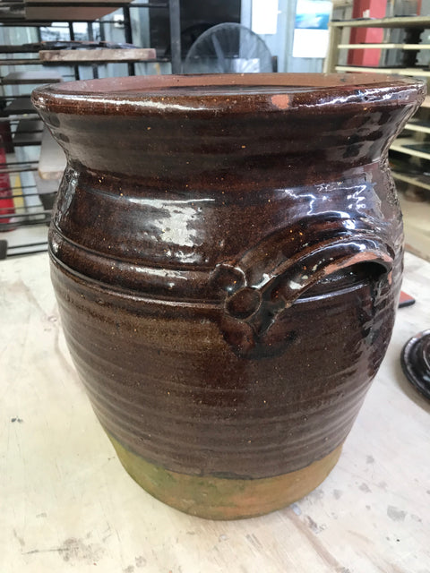 A vintage Anthony Morris pot urns up at a Garage Sale